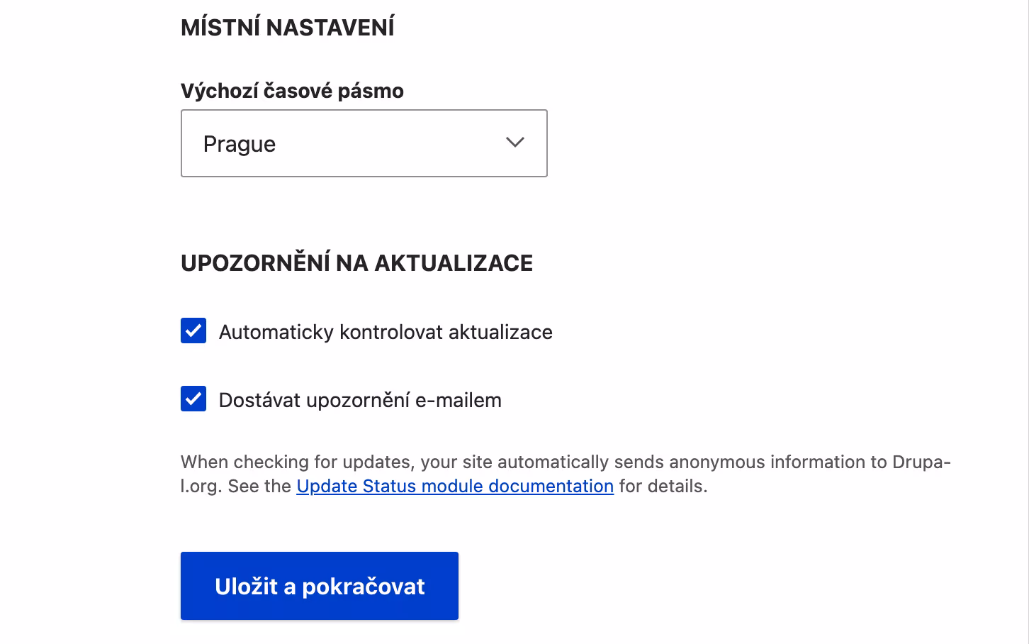 Místní nastavení s časovým pásmem Prague, upozorněními na aktualizace a tlačítkem Uložit a pokračovat.